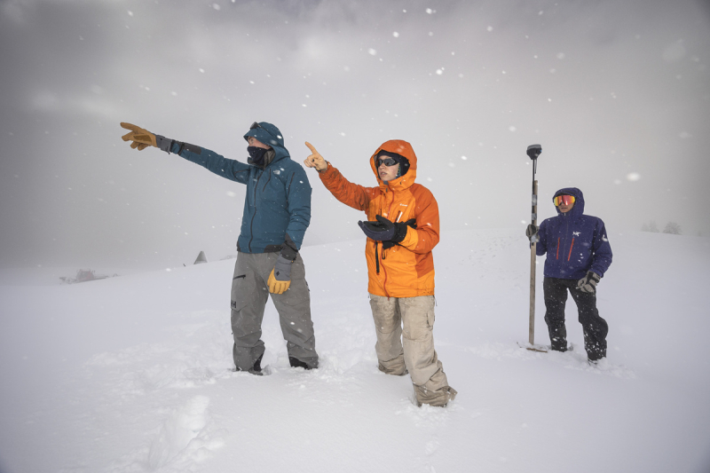 Students learning how to measure snowpack depth during a field school at the Lautaret Garden